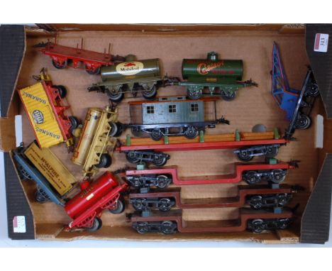 Large tray containing 13 assorted Hornby pre-war wagons including 3x trolley wagons, No. 2 timber, No. 1 crane truck, America