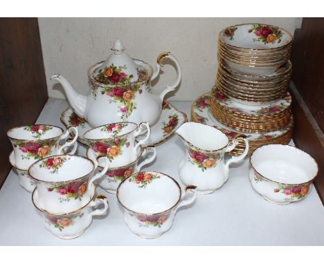 SECTION 18.  A Royal Albert 'Old Country Roses,' pattern tea set, comprising teapot, cream, sugar and sandwich plate, seven c