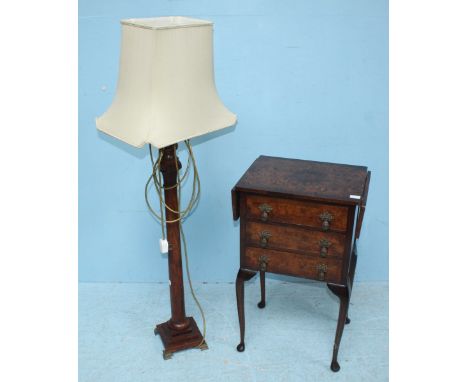 A stained walnut table lamp modelled as a composite classical column on square stepped base with brass Ogee bracket feet, 90c