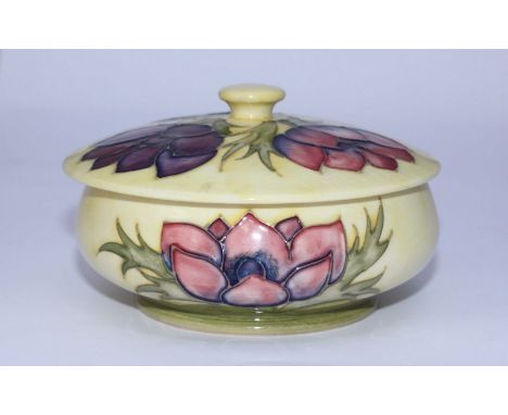 A Moorcroft pottery Powder Bowl & Cover of compressed globular form, decorated in the 'Yellow Anemone' pattern, impressed 'Ar