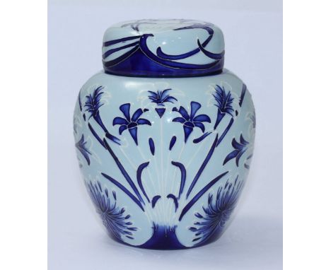 A Moorcroft pottery Ginger jar & Cover decorated with light and dark blue in a 'Florian' pattern after Phillip Gibson, signed