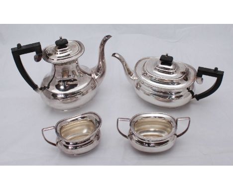 A silver-plated tea set by Garrard & Co. of London, comprising of a teapot, coffee pot and two sugar bowls etc. in Garrard ca