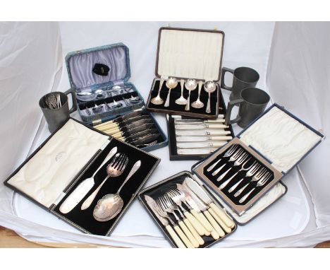 Three silver-plated cased sets of fish knives and forks, a silver-plated cased dessert serving set, two cased sets of spoons,