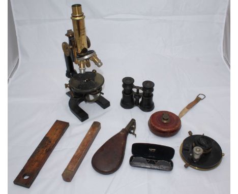 An Otto Telchgraber brass and black-lacquered microscope, together with a brass and leather gunpowder flask, Opera glasses, s