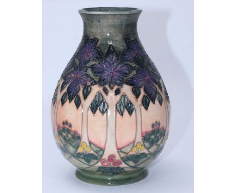 A Moorcroft pottery vase in the 'Cluny' pattern designed by Sally Tuffin, of bulbous form, date symbol of a 'candlestick' for