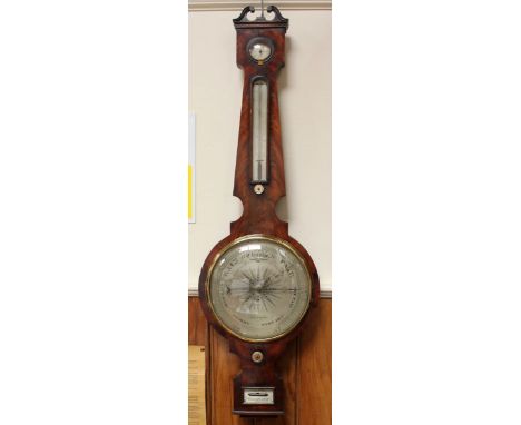 A late 19th century mercury Banjo barometer, with silvered dials, thermometer, hygrometer and barometer, approx. 105cm