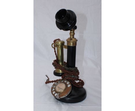 A 'No.150' brass and Bakelite stick telephone, 33cm high.