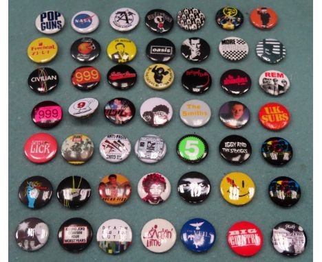 Various badges including Bucks Fizz, R.E.M, The Stranglers, The Rolling Stones etc reasonable used condition