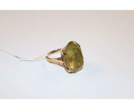 A 9ct gold ring set with large stone, approx. total weight 11gms