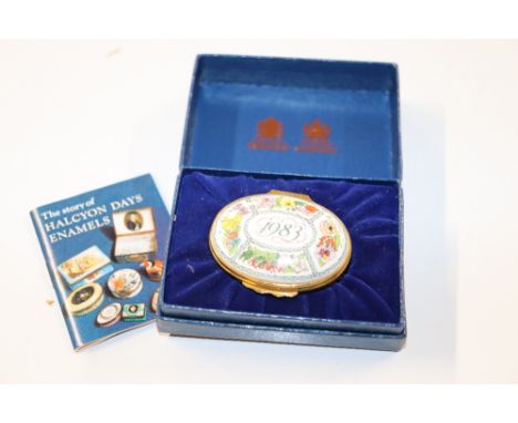 A boxed Halcyon Days enamel box and cover "A Year To Remember"