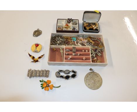 A box of assorted costume jewellery including various dress rings, yellow metal bangle, cuff-links, studs, brooches etc.