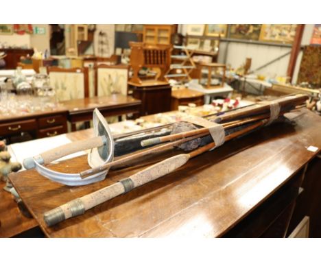 A vintage cricket bat; a fencing foil; fishing rod etc.