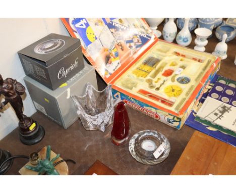 A HolmeGaard glass vase; an Orrefors glass vase with original box and one other red glass vase