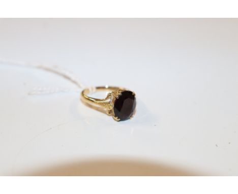 An 18ct gold and garnet set ring, approx. 5gms total weight 