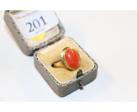 An 18ct gold and coral set ring, approx. 5gms 