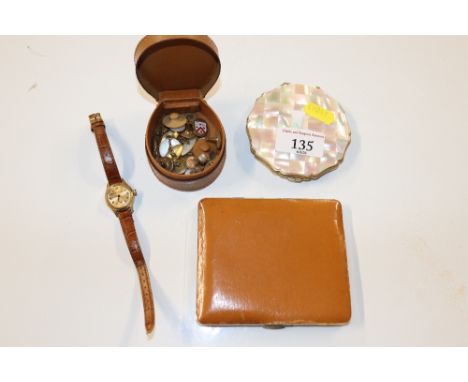 A mother of pearl mounted compact, a cigarette case, a wrist watch, a stud box and contents of various dress studs and cuff-l