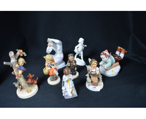 Group of Eight Goebel and Other Figurines 