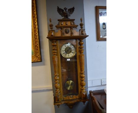 Large Vienna Wall Clock with Turned Supports, Lion &amp; Eagle Decoration, and Brass &amp; Enamel Face 