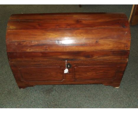 Contemporary sheesham wood dome top trunk. 
