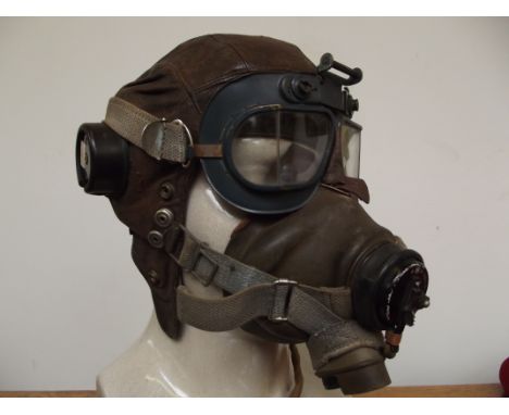 Aviation interest world war II pilot's leather flying helmet with oxygen mask and lining,together with two sets of flying gog