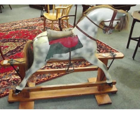 Vintage rocking horse, a later restoration by Haddon Rockers, leather saddle, horsehair mane and tail, pitch pine frame, leng