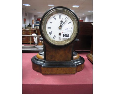 A XIX Century Walnut Ebonised Mantel Clock, with circular enamel dial, on a plinth base.