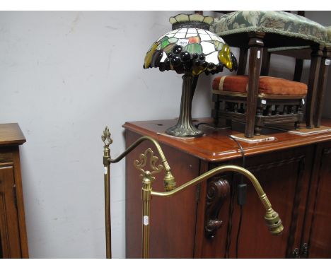 A Reproduction Tiffany Style Table Lamp and coloured glass shade and a pair of Laura Ashley brass standard lamps. (3) - untes