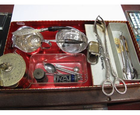 A Combination Vest/Coin Holder, a hallmarked silver handles button hook, a filter straw, plated jug and sugar bowl, tongs, ca