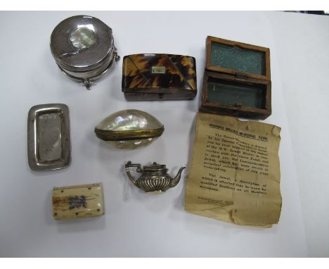 A Chester Hallmarked Silver Trinket box, with shell inset detail, raised on four feet; two small tortoiseshell trinket boxes,