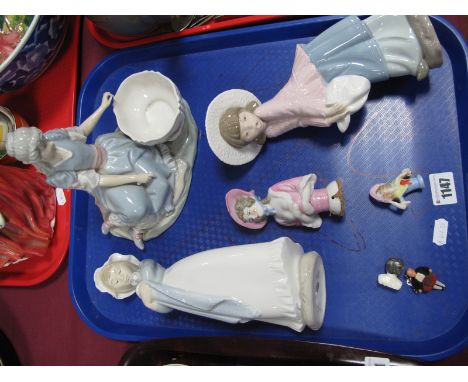 Two Nao Models of Young Girls, a Lladro seated lady with bowl (damaged), pin cushion dolls etc:- One Tray