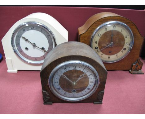 A 1930's Oak Cased Eight Day Mantel Clock, silvered chapter ring, Garrard movement and two other mantel clocks(3):- One Tray