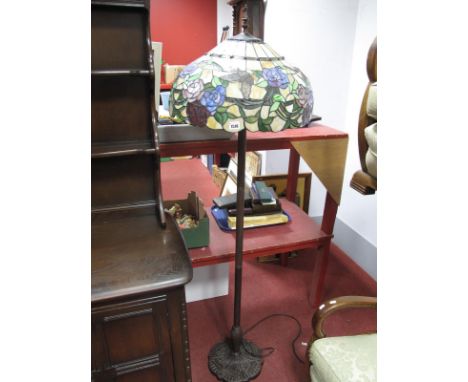 A Bronzed Standard Lamp, with Tiffany style shade.