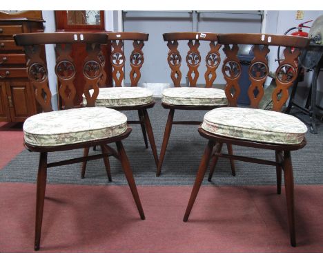 Set of Four Ercol Style Dining Chairs, with Fleur De Lys backs on splayed legs.