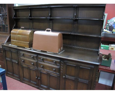 Ercol Dresser, with waterfall rack above, 216cm wide.