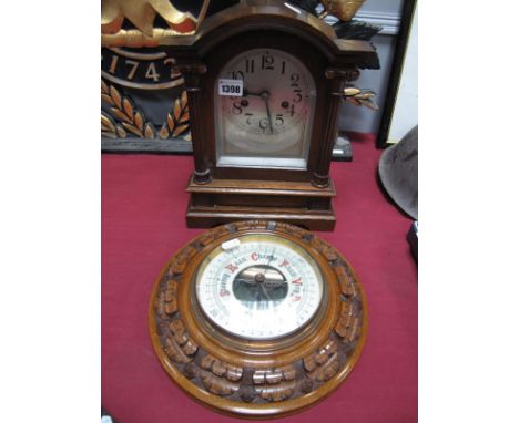 An Early XX Century Oak Cased Eight Day Mantel Clock, of architectural form, silvered dial, Arabic numerals flanked by fluted