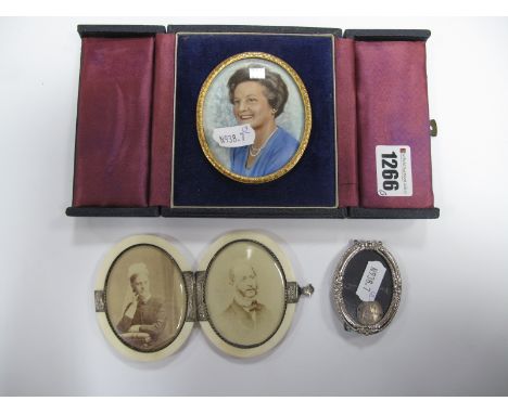 A XX Century Miniature, depicting a head and shoulders portrait of a lady wearing a pearl necklace stamped "Moseley - England