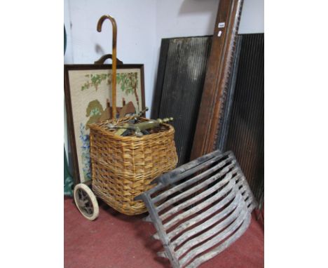 Woven Cane Mobile Shopping Basket, pair of brass andirons, fire grate and back plates, oak fender, firescreen.
