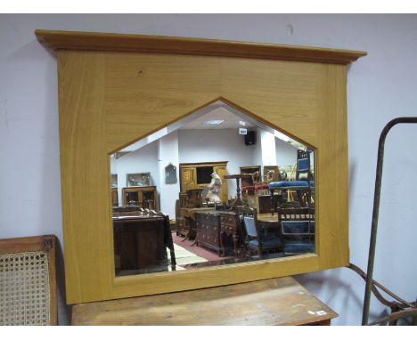A Bevelled Pentagonal Overmantle, in light oak frame.