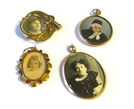 Four gold double photograph pendants, seed pearl and ruby framed examples, two marked 9ct