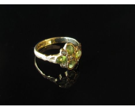 A 9ct gold peridot and pearl ring, size M, 2.6g