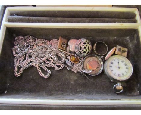 A quantity of silver jewellery including St Christopher pendants and a pair of cufflinks mother-of-pearl with horse head moti