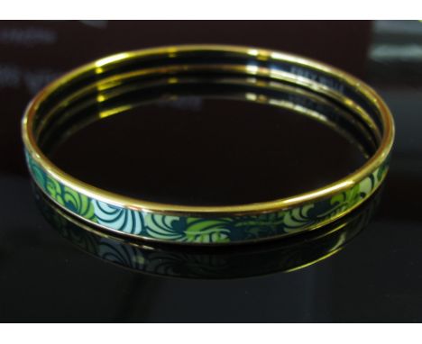 A Frey Wille enamelled bangle from the Sphinx Collection with passport