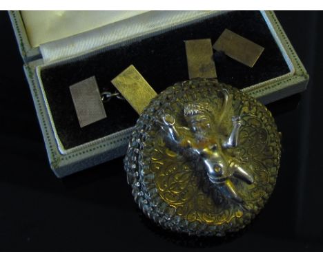 A pair of 9ct gold on silver cufflinks and a Reuge Ste. Croix clockwork musical brooch, cherub design, back marked made in Au