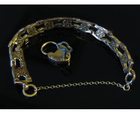 A fancy gate bracelet and padlock, marks rubbed, with working key, 13g     