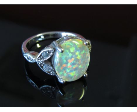 A dress ring opal style with white stones, size N