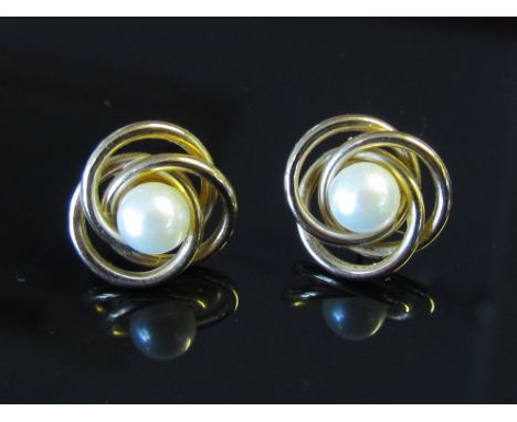 A pair of 9ct gold and pearl earrings