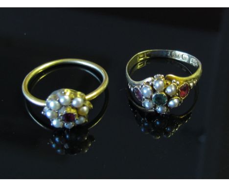 An 18ct gold ruby, emerald and pearl floral ring and a pearl and garnet floral ring. Size L/M and N, 3.8g