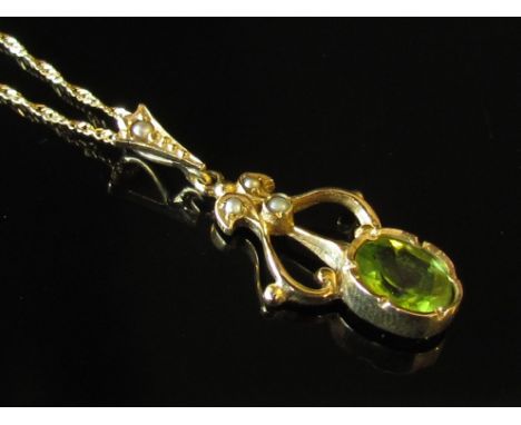 A 9ct gold peridot and seed pearl drop pendant hung on chain, clasp a/f, 3.1g