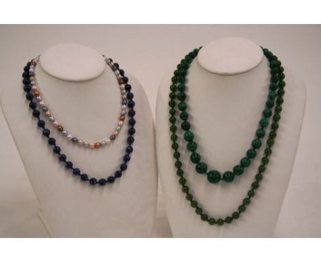 A jade bead necklace, set to a yellow metal barrel clasp; a malachite graduated bead necklace; a blue hardstone necklace; and