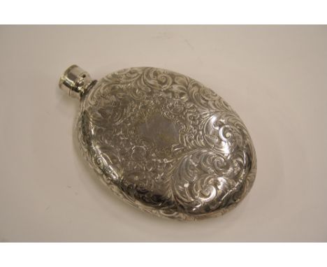 A good quality Victorian plated hip flask, having foliate engraved decoration, 12.5cm